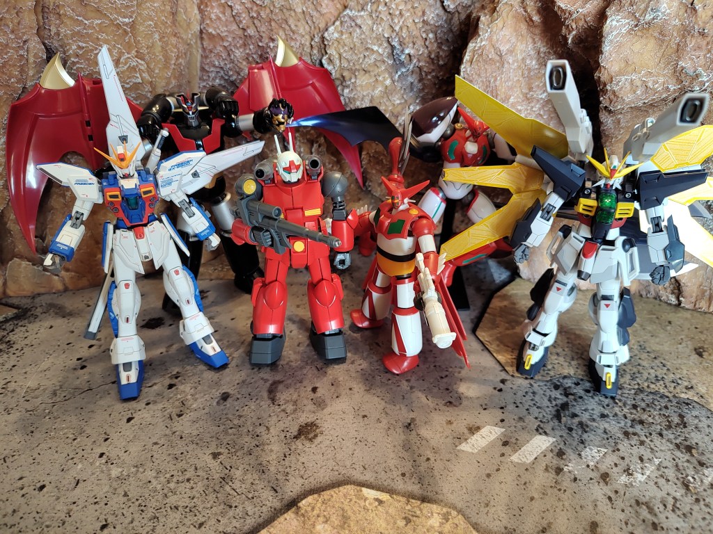 Here's a comparison shot with the GFF Gundam X on the left, HG 1/144 Guncannon, a non-scale SMP Getter Robo then a robot spirits Gundam Double X.  In the background we have Shin Mazinger Super Robot Chogokin (SRC) and a Revoltech Shin Getter Robo.